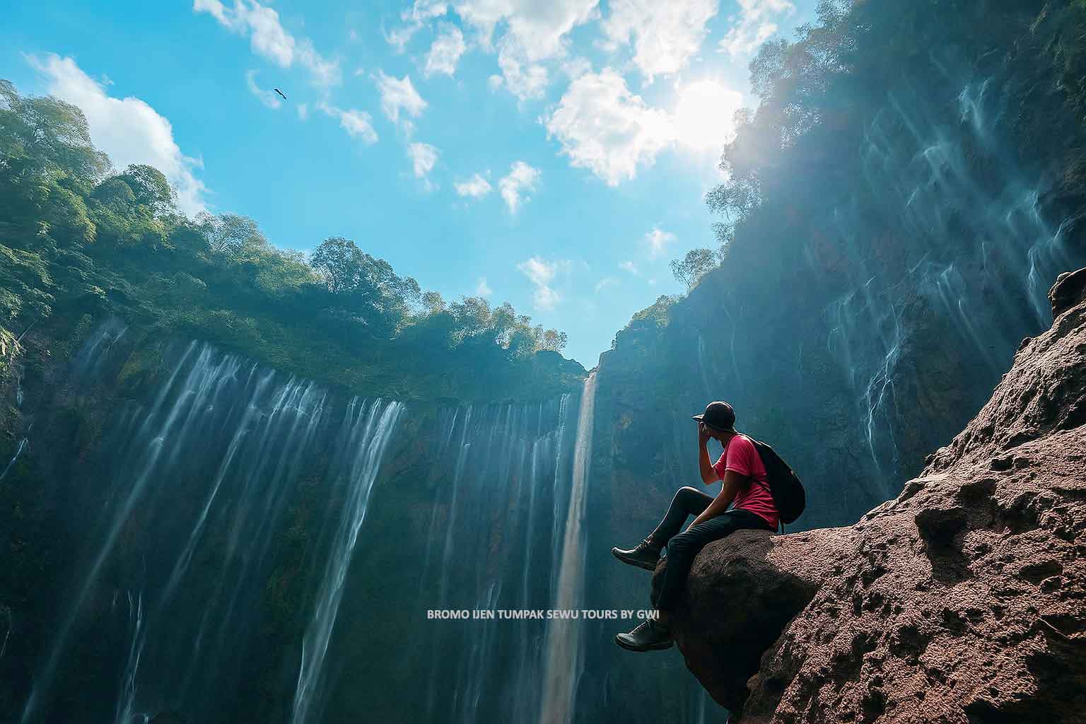 Bromo-Ijen-Tumpak-Sewu-tour-Traveler-enjoying-the-majestic-view