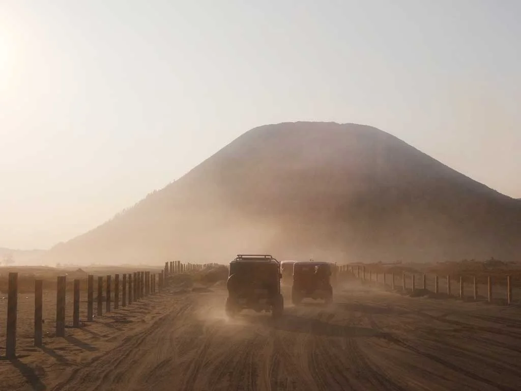 Take the 4WD Jeep Bromo sunrise tour on the sea of sand.